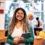 Adult learner smiling from a classroom